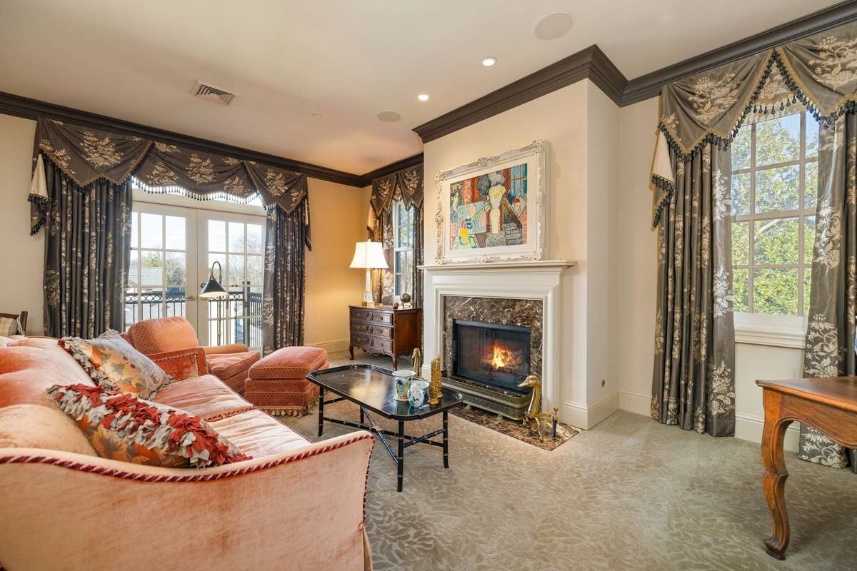 You'll love the seating option in this bedroom, providing a cozy spot to curl up in the morning with a cup of tea. Pictures taken when home was furnished. Condo is currently unfurnished.