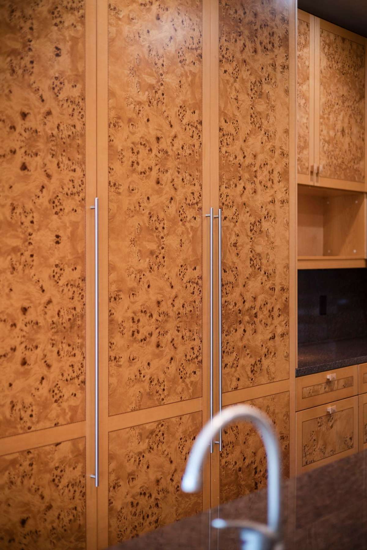 The unique cabinetry offers detail and interest.