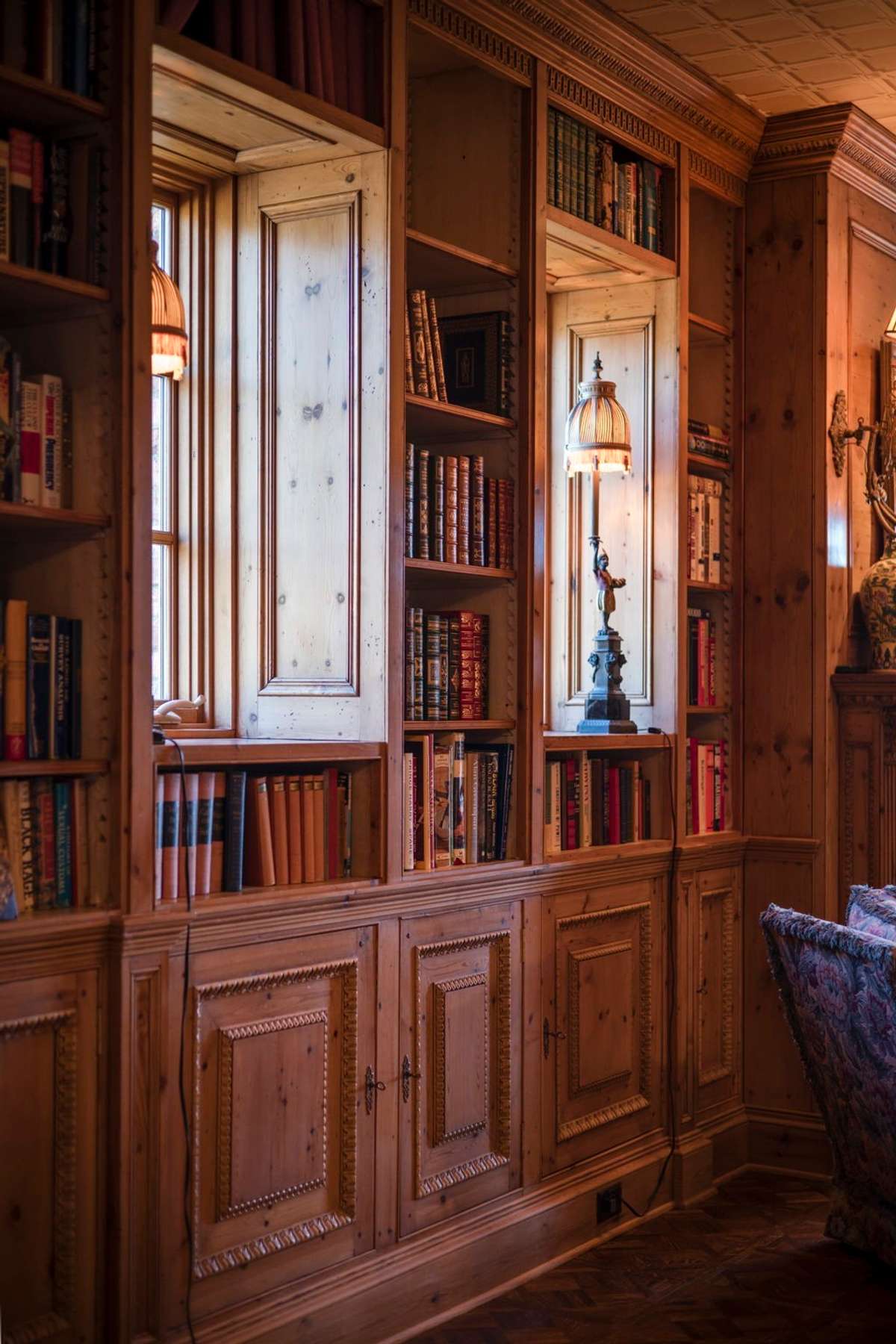 Bookcases surround the windows, making for a cozy afternoon with a good book under mild sunlight. Pictures taken when home was furnished. Condo is currently unfurnished.