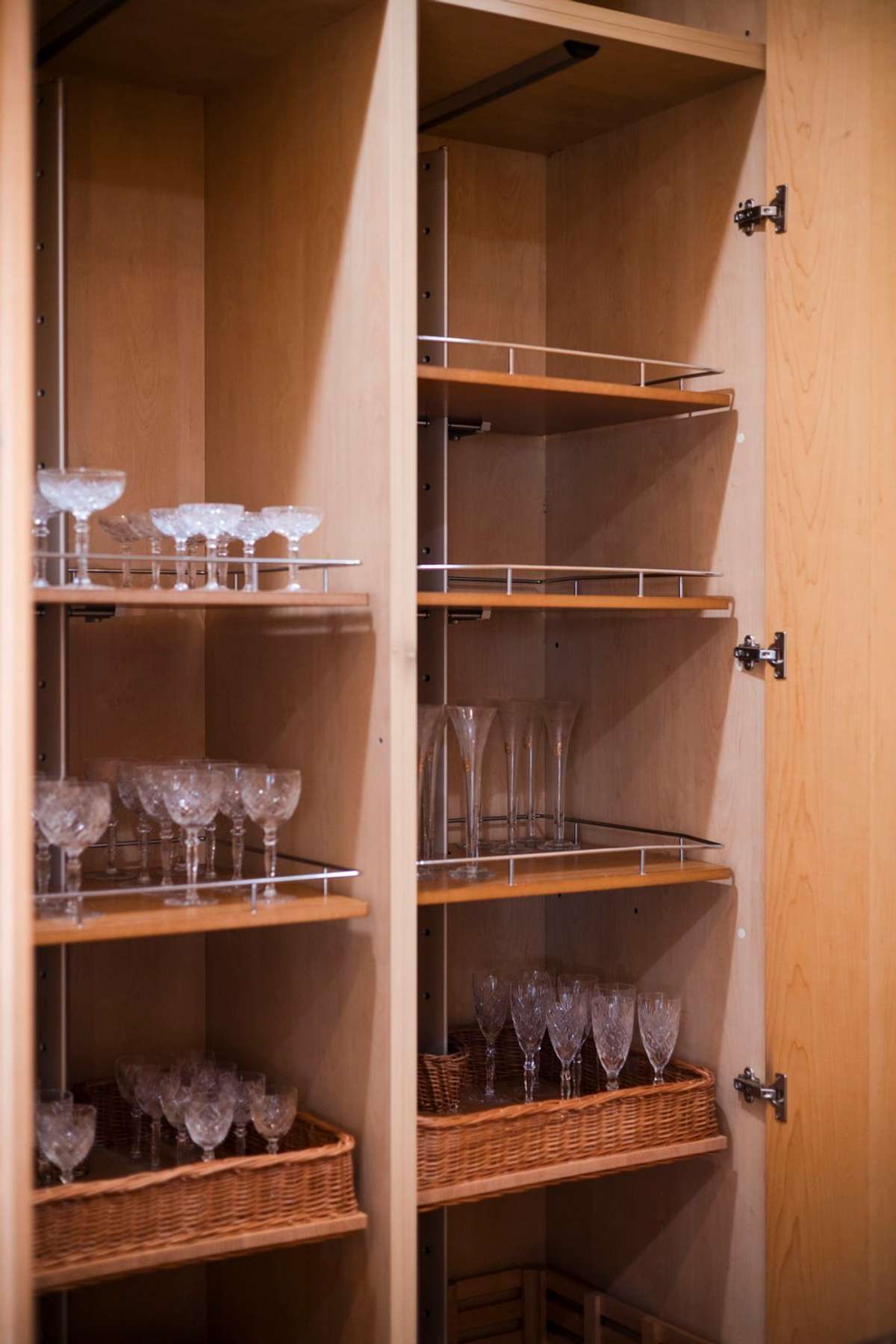 Notice the builder's attention to detail when it comes to elegant storage and organization.