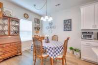 Attached to the kitchen, the dining area offers plenty of space for a table of multiple sizes.