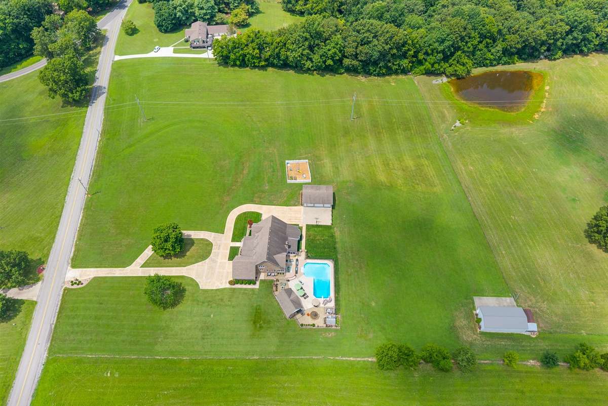 Fifteen acres included in the sale, additional land for sale. * Drone photography depicts more than what is currently listed.