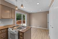 Convenient layout with kitchen, dining, deck and laundry accessible on the main floor.