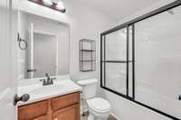 Secondary bath with tub/shower combo + fresh updates