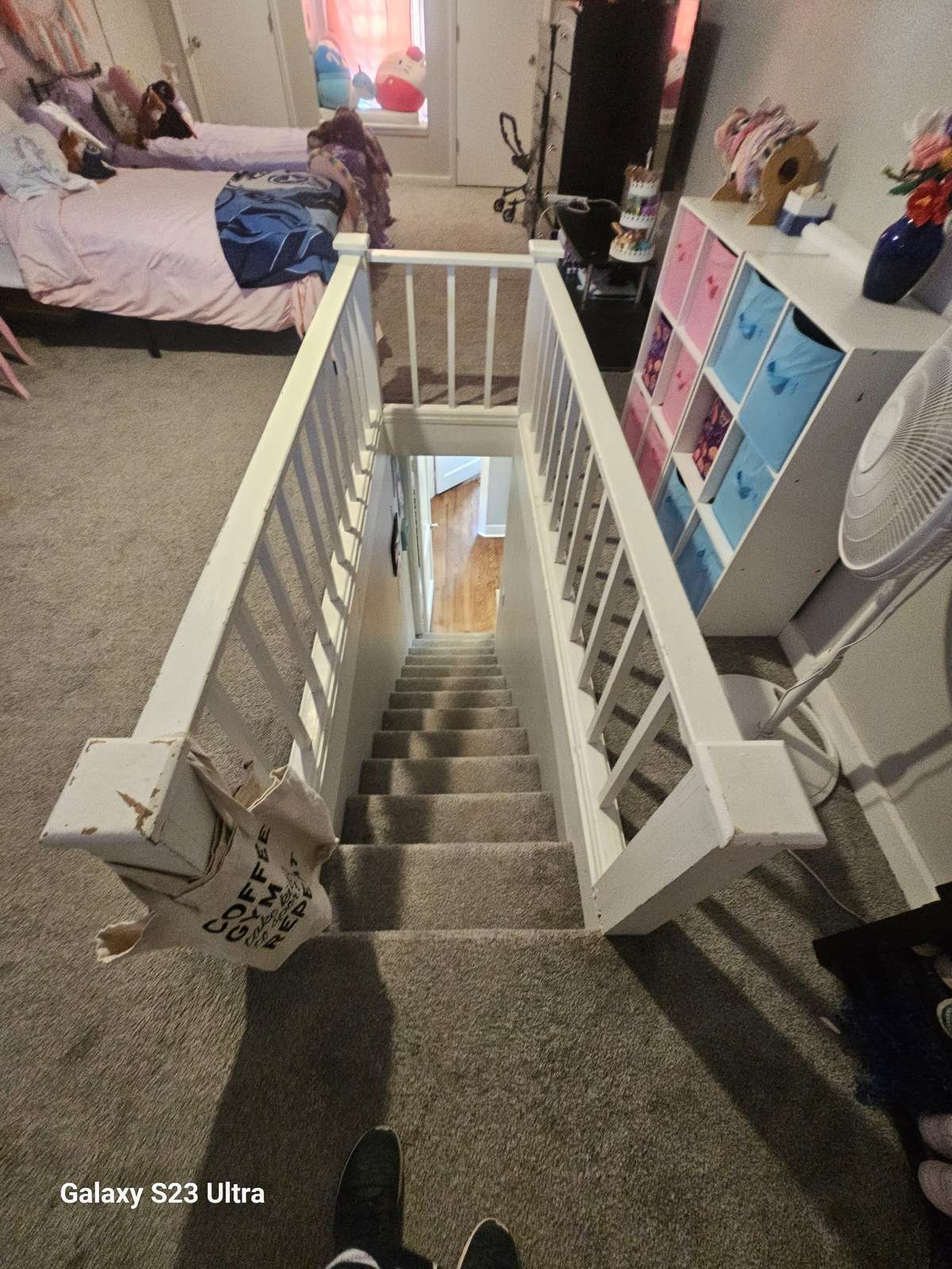 Stairwell leads to an additional bedroom—great for privacy or a separate guest space