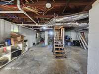 Climate-controlled basement with direct access to a spacious 4-car carport—perfect for comfort and convenience year-round.