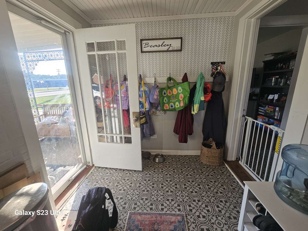 Mud room with direct access to the outside—perfect spot to kick off muddy boots and keep the mess out