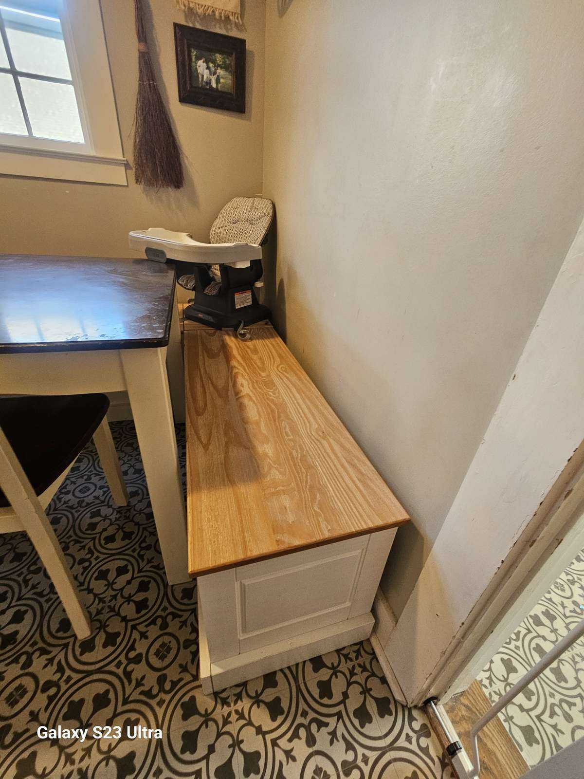 Freestanding bench in the dining room adds a warm touch—and it’s yours if you’d like it!