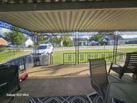 Oversized covered front porch—great for relaxing.