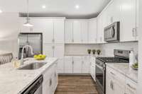 What's for dinner?  This space offers tons of storage, counter space and stainless appliances for the chef!