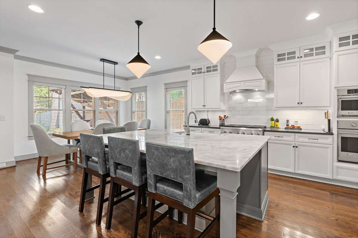 The kitchen is always the heart of the home, and this does not disappoint. Oversized island as well as spacious dining area.