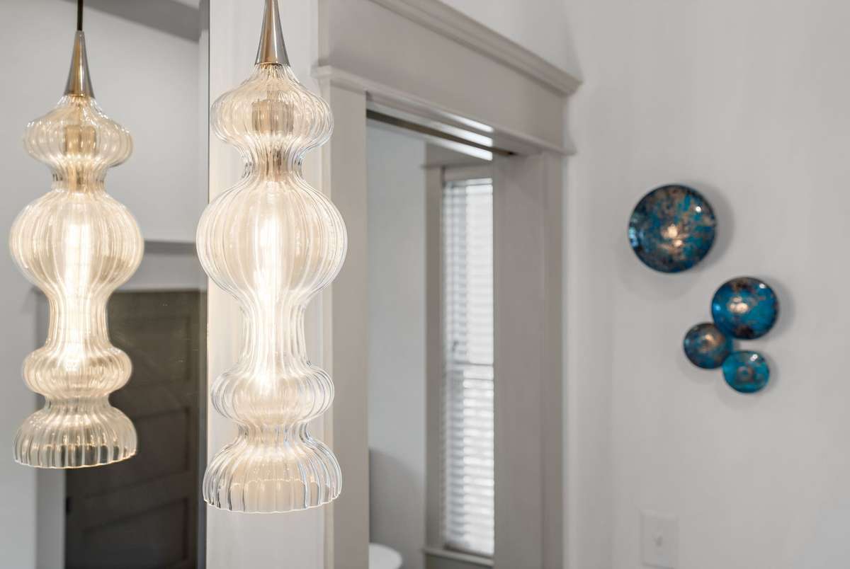 Visual Comfort lighting fixtures throughout the home.