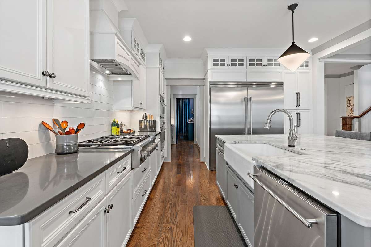 Plenty of storage, working space--and note the commercial size refrigerator!