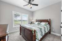 The guest bedroom has great lighting with a view!