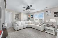 This is a bedroom being used as a nice relaxing space to unwind!