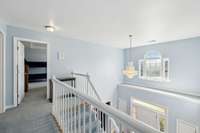 Lofted stair case over looking the entryway.  2326 Amber Glen Dr Murfreesboro, Tn 37128