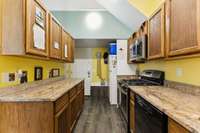 Kitchenette in the bonus room provides a microwave, stove, and dishwasher.  2326 Amber Glen Dr Murfreesboro, Tn 37128