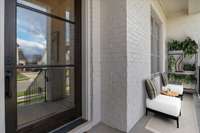 The Welcoming Front Porch is virtually staged! 

The modern black front door adds a striking contrast while providing a pleasant view of the surrounding neighborhood.