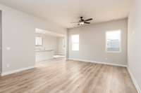 10-Ft Ceilings in this 19-ft x 14-Ft Living Room. Pictures are of a similar floorplan that was built previously. Representation ONLY. Buyer/Buyer's Agent to verify selections.