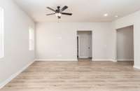 Foyer (Right), Downstairs Hall (Middle). Pictures are of a similar floorplan that was built previously. Representation ONLY. Buyer/Buyer's Agent to verify selections.