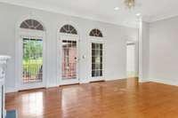 Access your covered patio and open air courtyard through your living room.