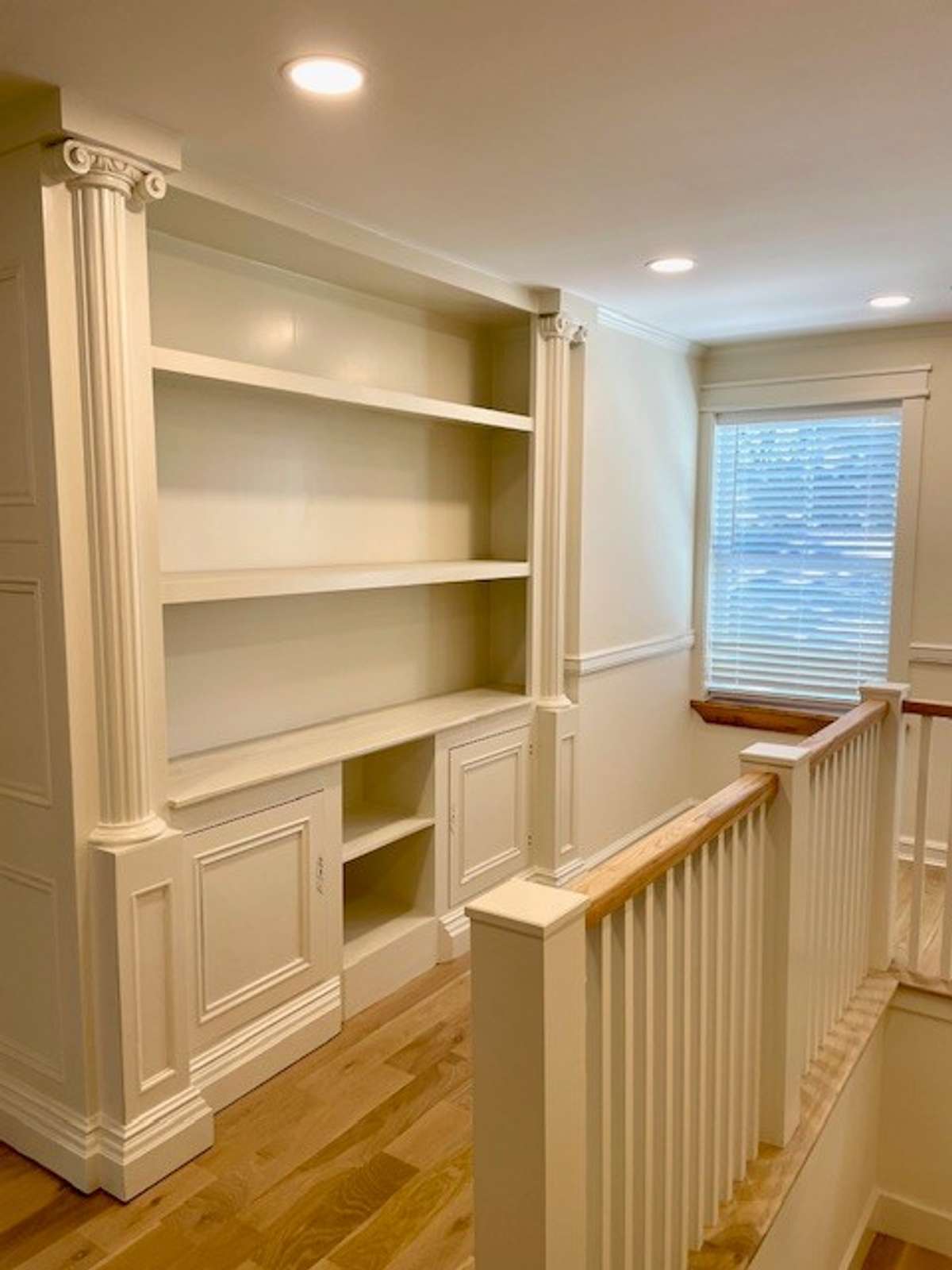 Custom Cabinets at the top of the stairs.