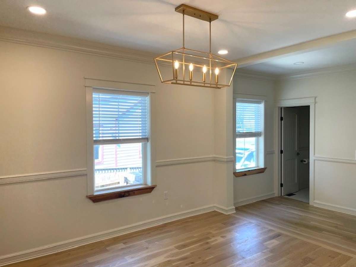 Dining Room off of Kitchen. Half bath in the distance.