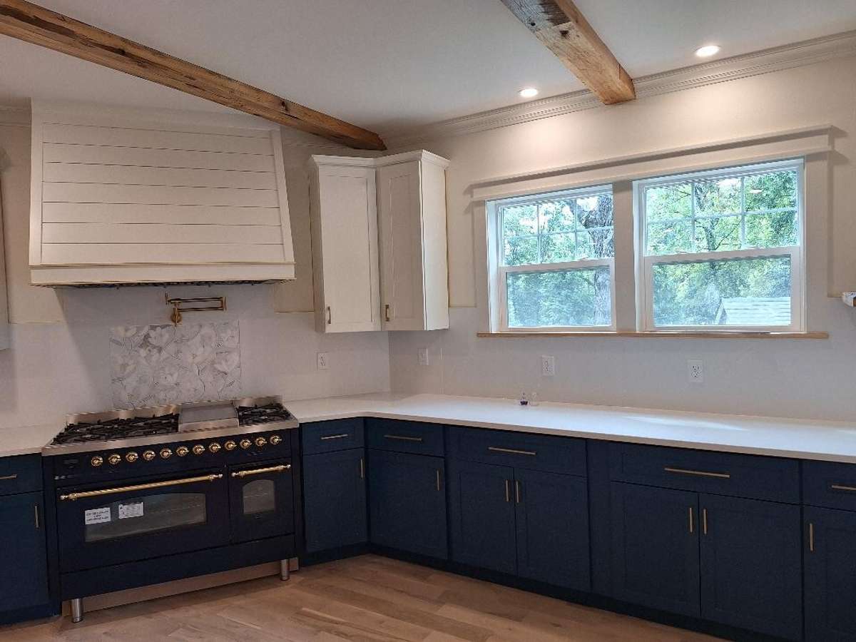 Gas stove top and double oven.  Plenty of counter and cabinet space plus a pantry!