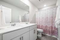 Upstairs hall bath. I love the double sinks.