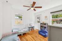 Bedroom 2 on main level with access to back deck.