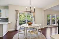 The kitchen counter allows for 3 barstools. And the sliding doors give easy access to the deck and backyard. In fact, let's take a peek at the deck before we check out the family room