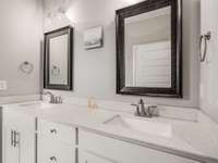 Beautifully designed primary bath with double vanity