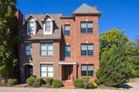 Check out the beautiful brick exterior.  As you enter 410, the stairwell separates each Unit's living space ensuring ultimate privacy and quiet living.