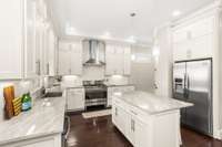 Lots of cabinet storage and a separate pantry