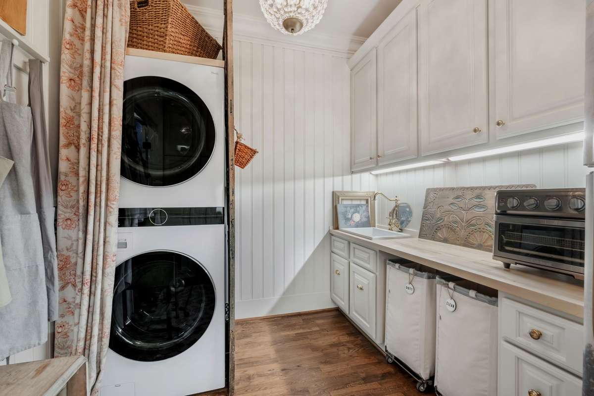 This main floor laundry has capability to have side by side washer and dryer if so desired