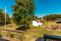 Both storage buildings remain with the property.