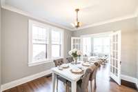 The hardwood floors add warmth to the space along with the natural light.