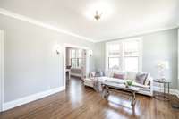 Cozy yet open layout offers the perfect setting for gatherings, with the fireplace adding a touch of historic elegance.