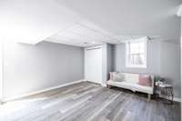 This space is a cozy spot for watching a movie or enjoying a great book!