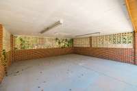 With the main structure already in place, you could easily convert this space into an enclosed garage.