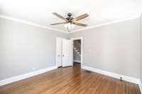 This flexible space offers endless possibilities, located conveniently near the main level bath for added functionality