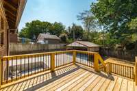 The fenced backyard adds great privacy