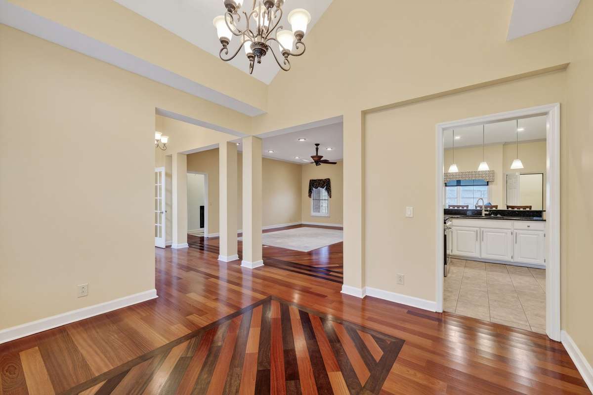 View to living room and kitchen from dining area