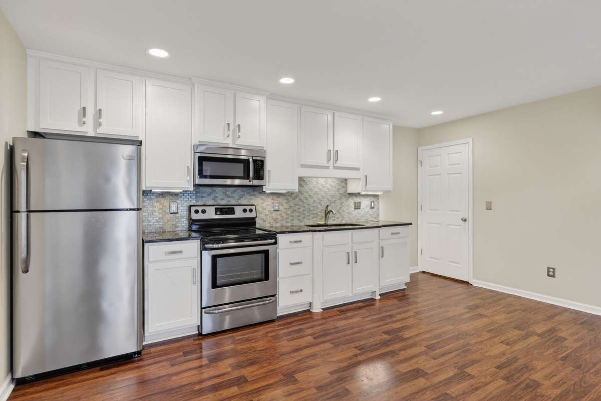 Kitchenette in the inlaw suite or could be used for rec room or office