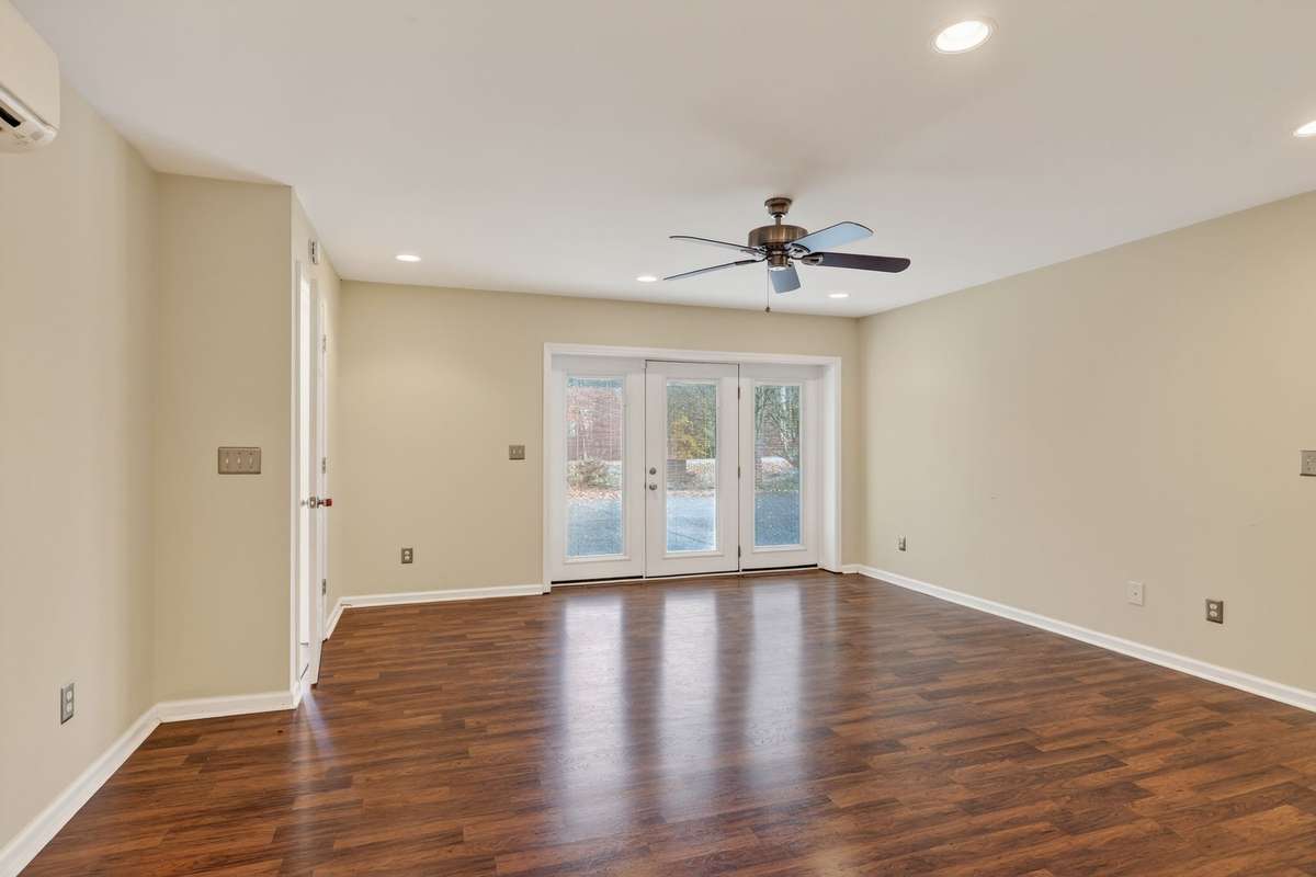 living area in the inlaw suite or downstairs apartment could be used for teenagers hang out or business space for home business
