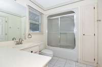 Full Bath- tile flooring, tub/shower combo, linen closet