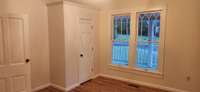 Bedroom #2 (13x15) in front of home beside the foyer.