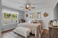 Primary suite with beautiful decorative shiplap wall...