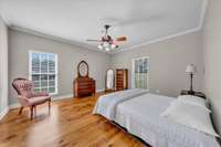 A large space ready for a king size bed, dressers, and a sitting area!