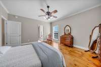 This primary bedroom is calming and spacious!